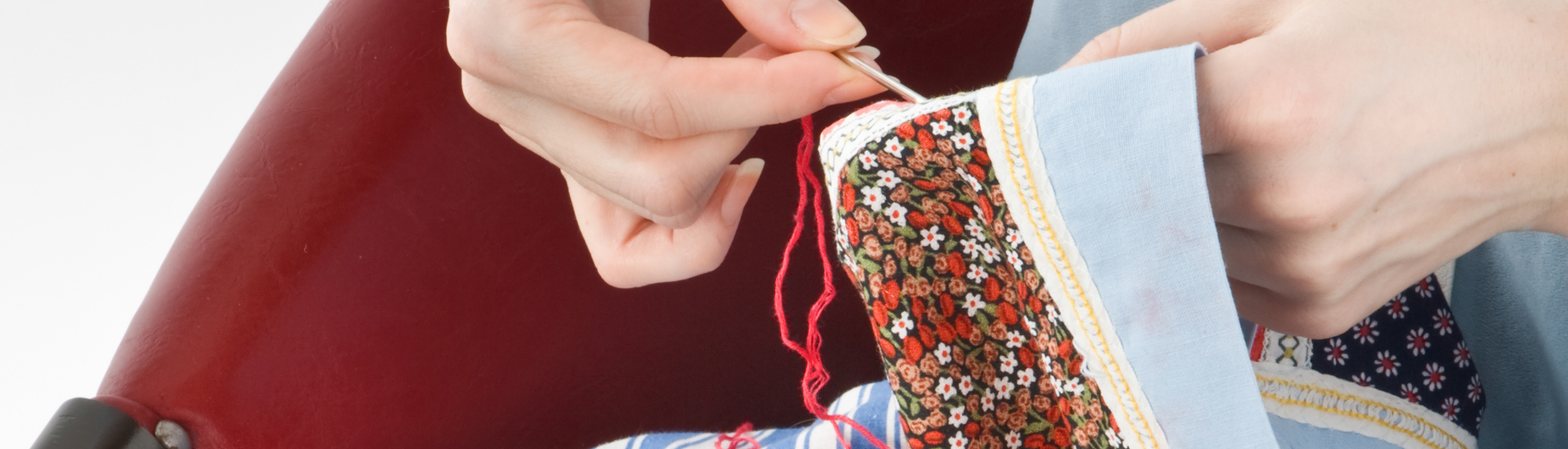 Close-up of Woman Stitching Quilting